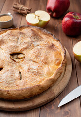 Homemade apple pie with fresh red apples