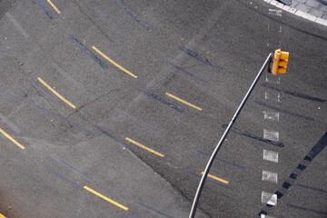 Elevated view of traffic signs painted on an avenue
