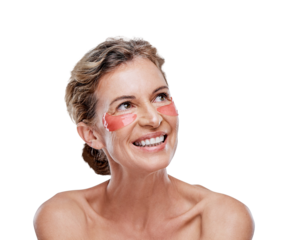 A mature woman wearing under-eye gel patches while posing against isolated transparent PNG background