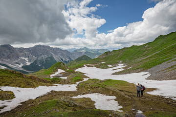 Fototapeta premium Between Italy and Austria: on the top of mountain near Volaia Lake Raunchkofer Mountain (Lago di Volaia Monte). Mountain hiking Trail Road.