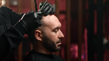 Skilled barber hands cutting customer hairstyling hair grooming use scissors closeup slowmo