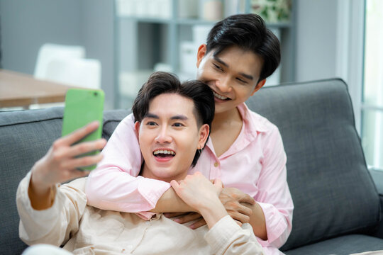 Young gay couple making selfie and feeling happy. Concept of LGBT and Love.