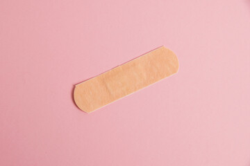 Flatlay, medical bactericidal patch on a pink background