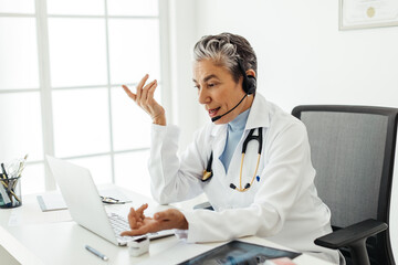 Telehealth visit: Doctor talking to a patient over a virtual consultation