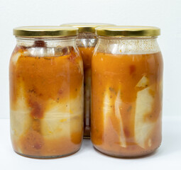 Stuffed cabbage in a jar with tomato sauce - homemade preserves with cabbage and minced meat
