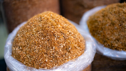 Tobacco ready to be rolled up as cigarettes in a sack