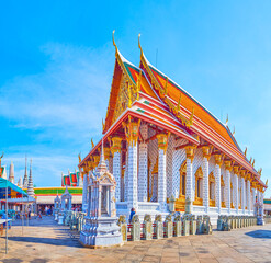 The Ordination Hall temple in surrounding of small shrines of Wat Arun complex in Bangkok, Thailand