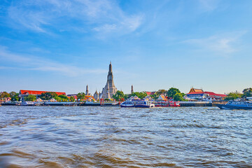 Wat Arun is one of the most spectacular temples in Bangkok on the riverside of Chao Phraya river, Thailand