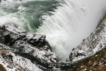 Photograph of an Icelandic waterfall seen from above.