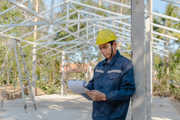 Engineer checking work at construction building