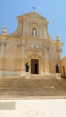 Gozo Cathedral, or Il-Katidral ta' G_awdex.  Sunshine and blue sky