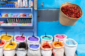 Colorful spices and dyes in the street of the blue city, Chefchaouen, Morocco.