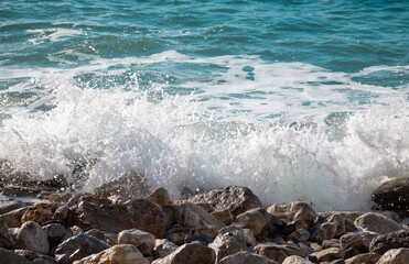 A wave rolls on the shore of the Adriatic Sea. Selective focus