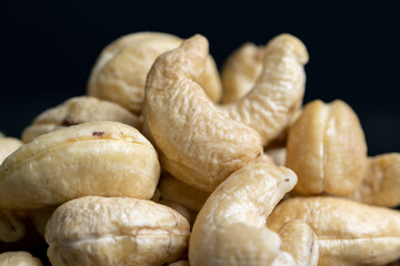 Hard roasted and peeled cashew nuts on the table