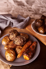 Baked grilled vegetables - carrots, potatoes, beetroot. Whole food diet, Mediterranean diet. Vertical photo