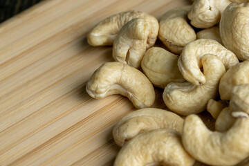 Fresh peeled cashew nuts on the table