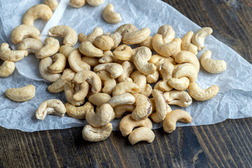 Hard roasted and peeled cashew nuts on the table