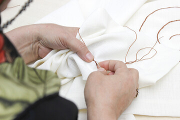 detail shot during fabric sewing