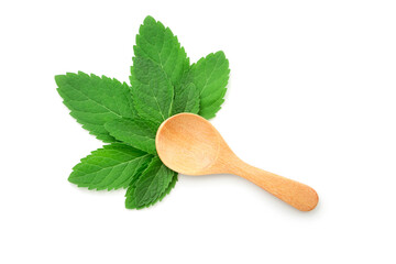 Spare mint leaf with wooden spoon isolated on white background.