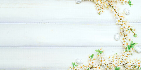 Easter eggs wood banner. April floral nature, white happy easter eggs on wood spring background. Easter pattern with place for text. 