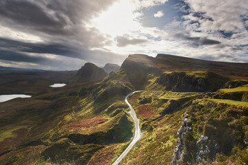 Road in the middle of Quirang mountains in Skye