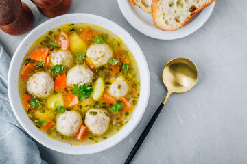 Meatballs soup. Chicken turkey vegetables meatballs soup with carrots and potatoes.