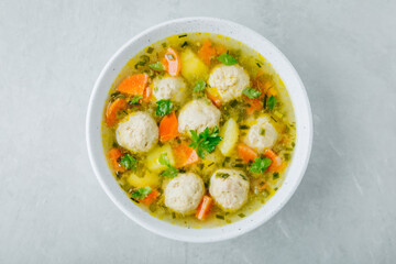 Meatballs soup. Chicken turkey vegetables meatballs soup with carrots and potatoes.
