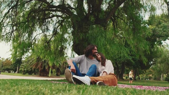 Couple in love enjoying time together at picnic in the park