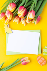 Template for Easter greeting card. Blank card and bouquet of tulips