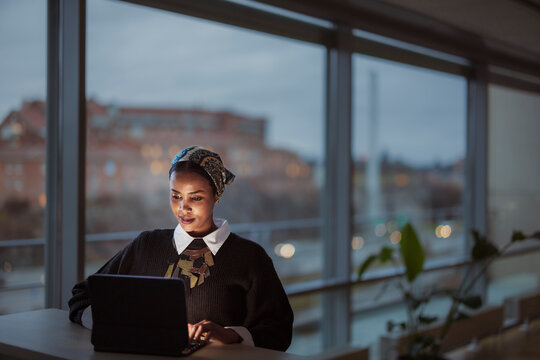 Young woman working on laptop