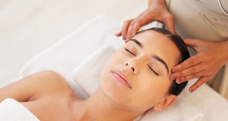 Fototapeta na wymiar Spa, head massage and calm woman enjoying a relaxing treatment in a wellness, health and beauty center. Relax, peace and therapist doing relaxation therapy for a girl at a luxury natural salon.