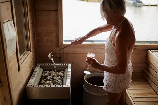 Senior woman in sauna