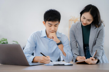 Fototapeta premium Business team present. professional investor working new start up project. Finance managers meeting.using laptop and chart in modern office.