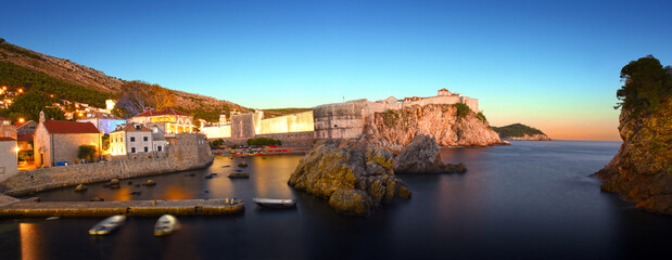 panoramic night view to the city skyline of Dubrovnik's Old City while sunrise, Croatia
