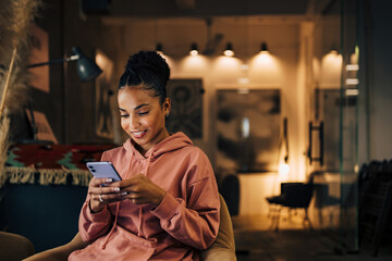 African businesswoman received a funny message on her phone.