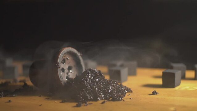 the smoke spreads to the tobacco and the bowl of the hookah. High quality Full HD video recording