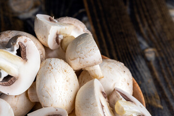Cooking a dish of mushrooms cut into pieces