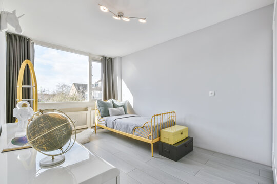 Contemporary bedroom interior with globe