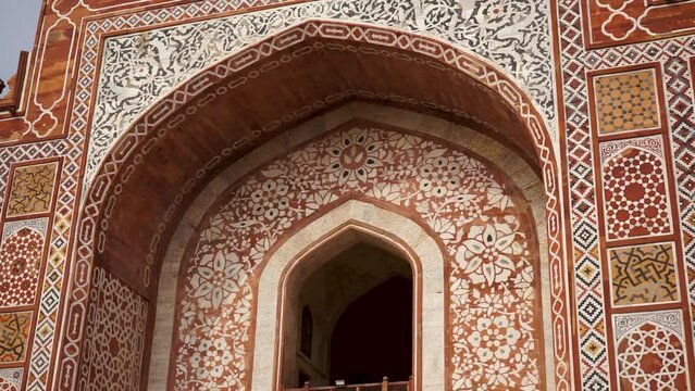 Beautiful floral work of white marble on entrance of Sikandra tomb, Agra