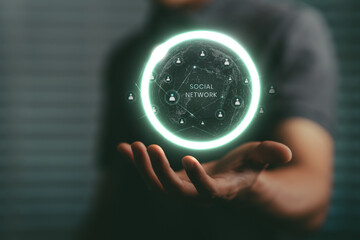 Social networking concept, businessman raising hands There is a glowing 3d globe image. And has a social network icon on the hand, to indicate communication through the online world.