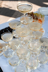 Glasses of champagne on the festive table. serving for the wedding ceremony