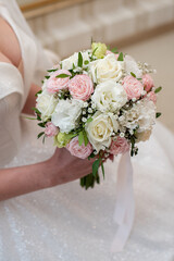 delicate wedding bouquet in the hands of the bride. idea for event agencies