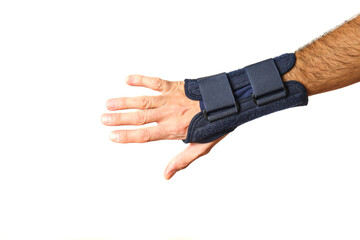 man's hand with therapeutic wrist brace to relieve wrist sprain pain on pure white background