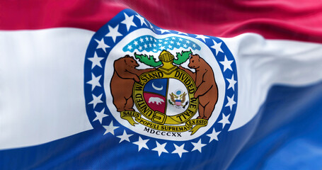 The US state flag of Missouri waving in the wind