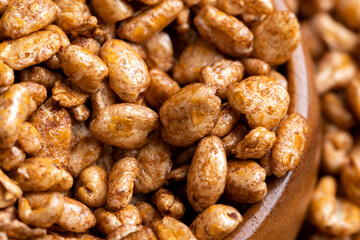 Airy wheat covered with a thin layer of cocoa chocolate