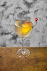 Gimlet cocktail with peach