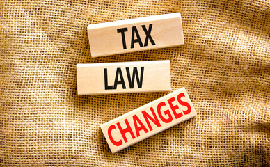 Tax law changes symbol. Concept words Tax law changes on wooden blocks on a beautiful canvas table canvas background. Business tax law changes concept. Copy space.