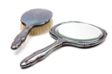vintage hand brush and hand mirror isolated on white background