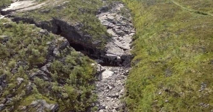 Aerial view of Galggojohka river on the E8 Nordlysveien road in summer when it&acute;s dried up, Storfjord, Troms og Finnmark, Norway. 