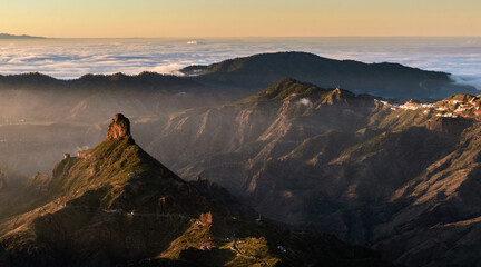 Panoramic view of Roque Bentayga and Artenara hill town at sunset, Nublo Rural Park, Gran Canaria, Canary Islands, Spain